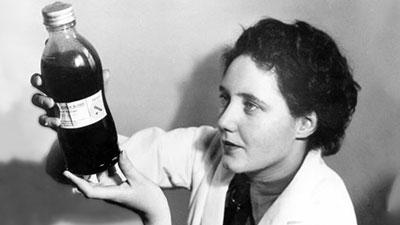 Vintage photo of a nurse holding a blood sample