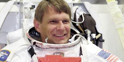 Dr Piers Sellers in a spacesuit