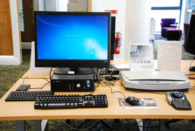 Accessible workstation, Noreen and Kenneth Murray Library, with flatbed scanner, compact keyboard, independent number pad and tr