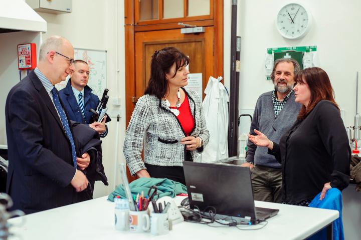 Professor Stuart Haszeldine and Dr Katriona Edlmann describe current research to UK Energy Minister, Claire Perry, during a visit to the Universdity of Edinburgh's School of Geosciences labs in November 2018. 