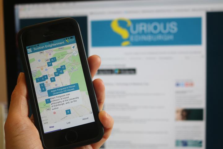 Photo of smartphone showing the Curious Edinburgh app