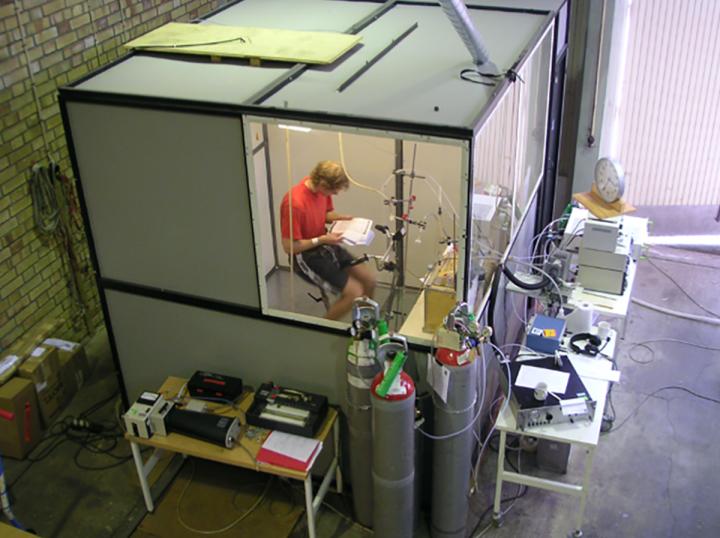 A volunteer cycling and reading during a dilute diesel exhaust exposure in the facilities at Umea University, Sweden