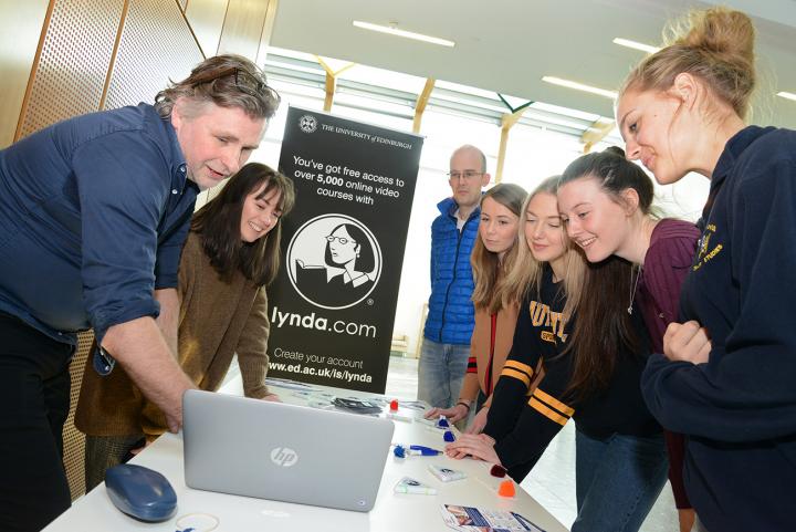 The digital skills team demonstrating Lynda.com to a group of people.