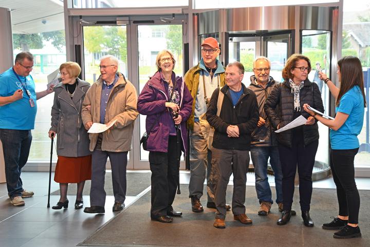 A group of people arriving at the Roslin Institute building during the open day