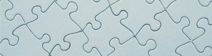 Image of a pale blue-green puzzle