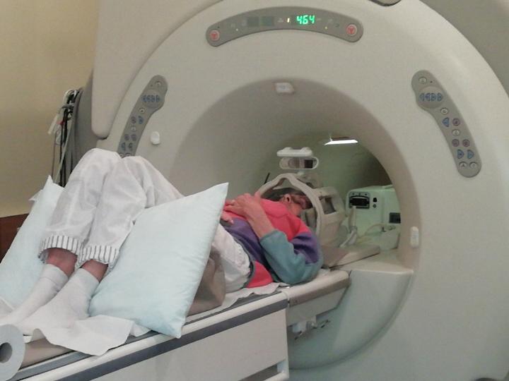 A cohort participant undertakes an MRI scan