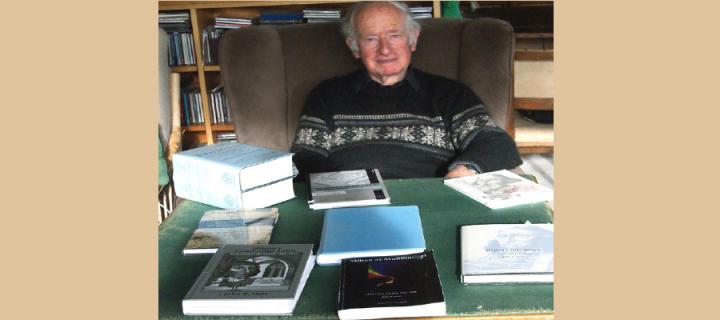 Dr John Hale with the books he has written