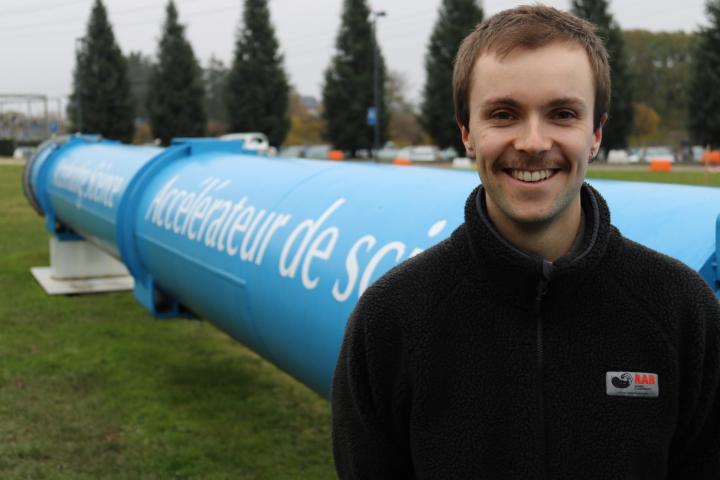 PhD student Tom Carter outside CERN.