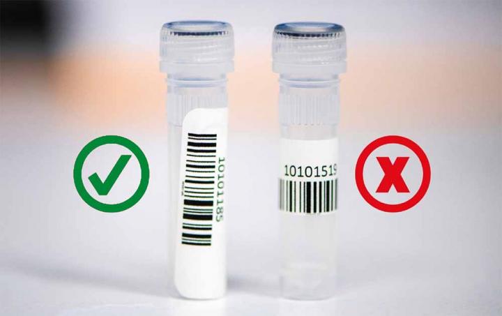 Image showing two sample collection tubes, one with the correct barcode placement, and one with an incorrect placement.