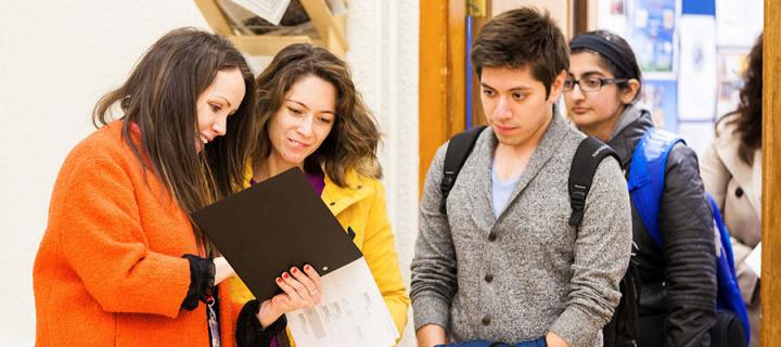Students looking at a timetable