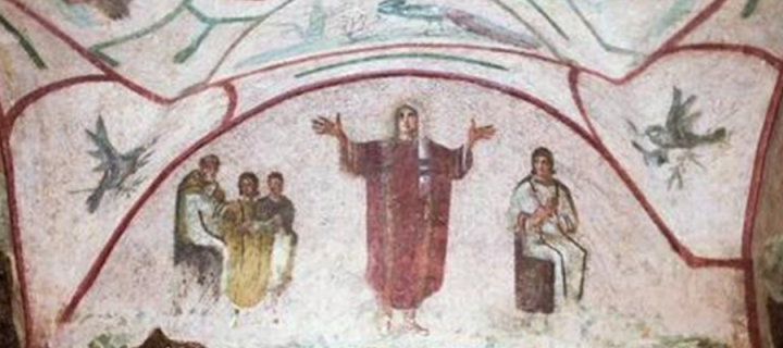 A fresco that shows a female figure with her hands outstretched