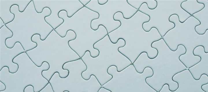 Image of a pale blue-green puzzle