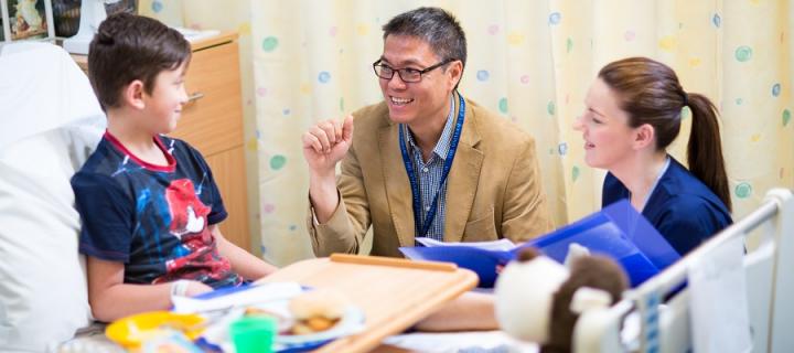 Dr Richard Chin meets with a patient