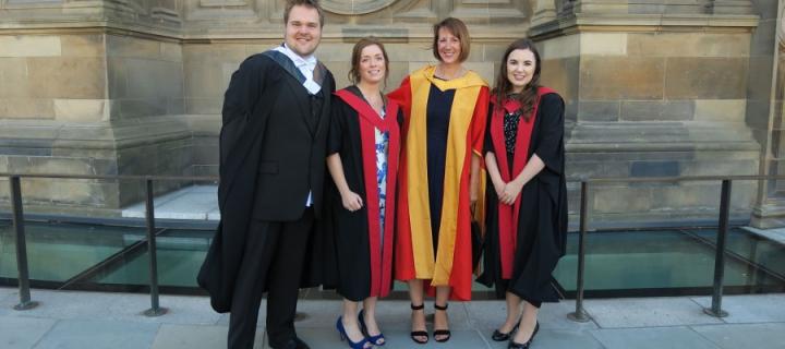 Professor Jayne hope with three of her successful postgrad students