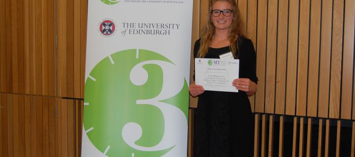 Phoebe Kirkwood receiving her prize for the three minute thesis competition