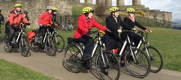 Staff cycling on Calton Hill