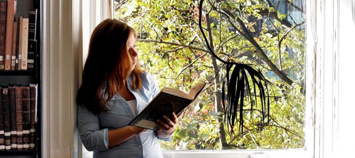 Woman reading in the window