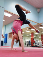 Student doing gymnastics in the Centre for Sport and Exercise