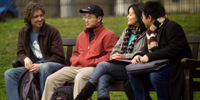M 090722 International hosts sought four students sitting on bench