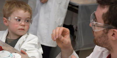 M 091103 Staff kids join Chemistry kids doing science