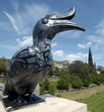 Hornbill sculpture overlooks Scott Monument as part of the Jungle City exhibition.