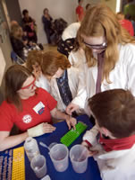 Student demonstrators and children enjoy the Science Festival events at the National Museum