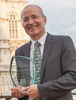 Professor Charlie Jeffery with award