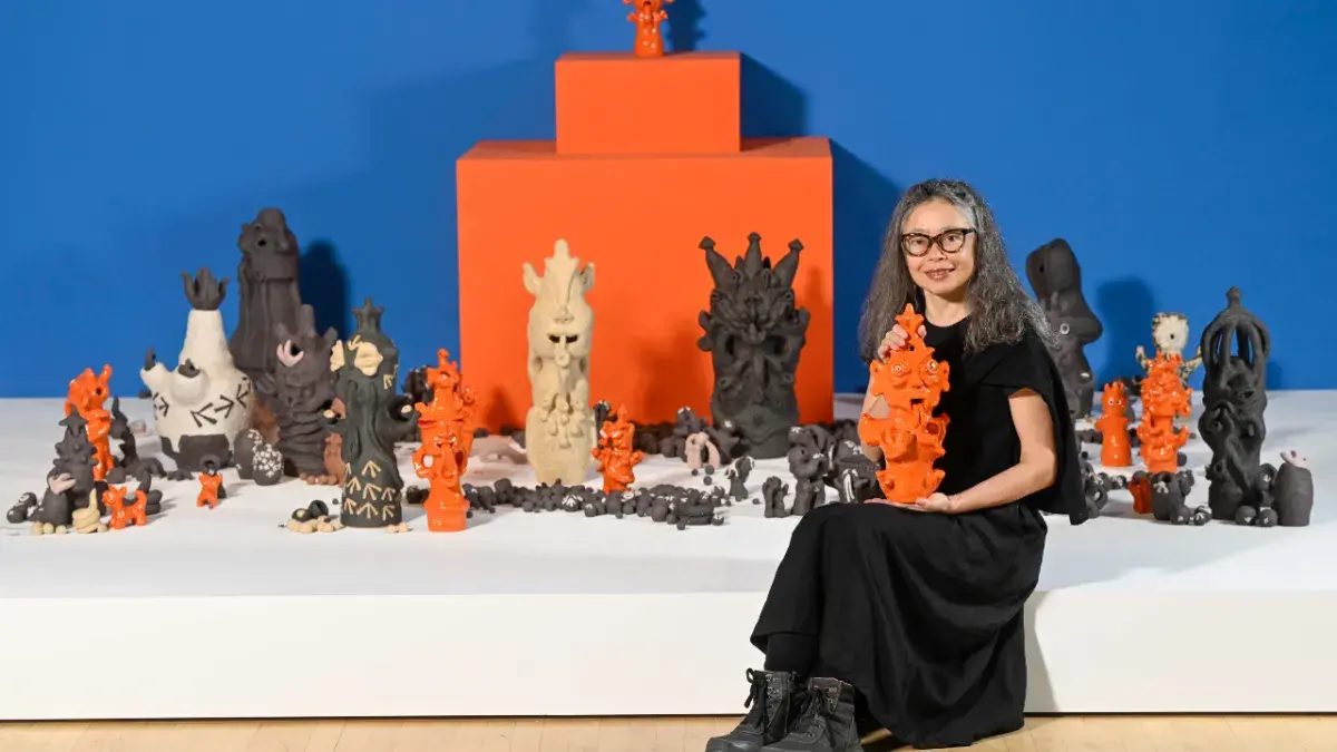 Artist Mai Nguyễn-Long pictured with glazed works from her celebrated Vomit Girl project