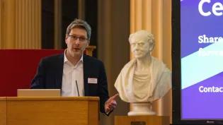 The director of Edinburgh Global addresses the Education Beyond Borders celebration event.