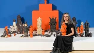 Artist Mai Nguyễn-Long pictured with glazed works from her celebrated Vomit Girl project