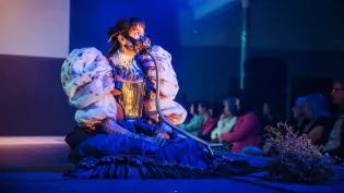 A model wears an elaborate design by ECA Performance Costume students at their graduate showcase