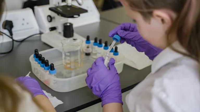 School pupils conducting a science experiment as part of the Castlebrae Superlab.