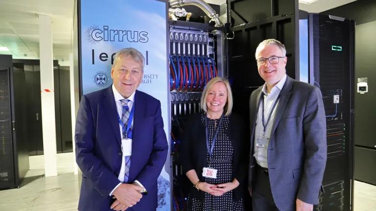 Professor Sir Peter Mathieson, Lynn McMath and Professor Mark Parsons in front of the Cirrus supercomputer