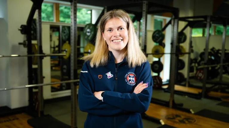 Distance Runner Megan Keith poses in the University gym. 