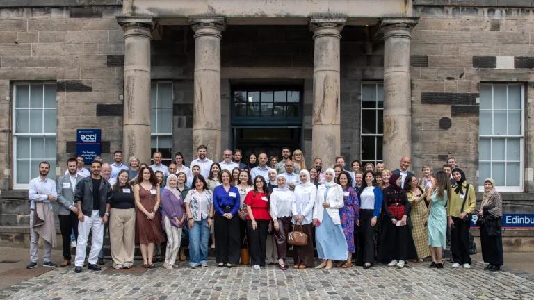 Attendees of the HESPAL annual gathering assembled outside the ECCI building. 