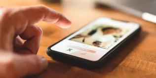  A man using an online dating app