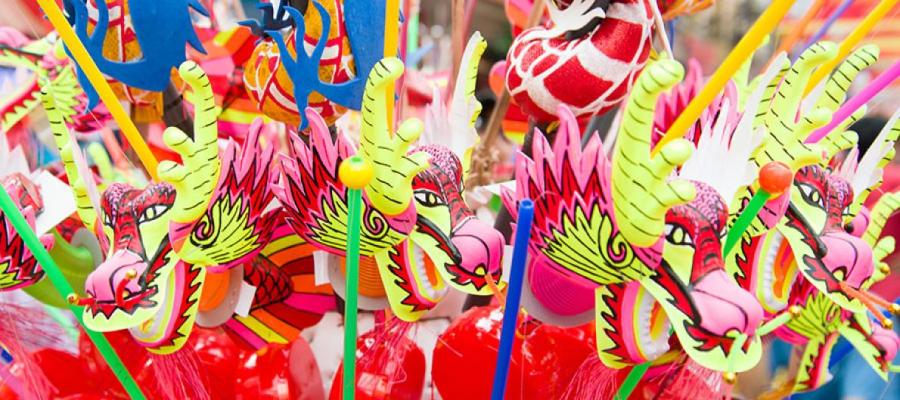 Brightly coloured Chinese dragon puppets