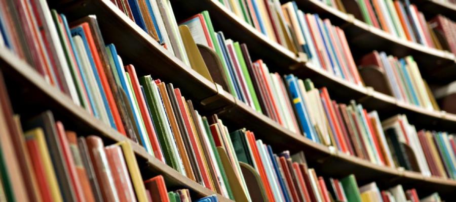 Curved bookshelf full of books