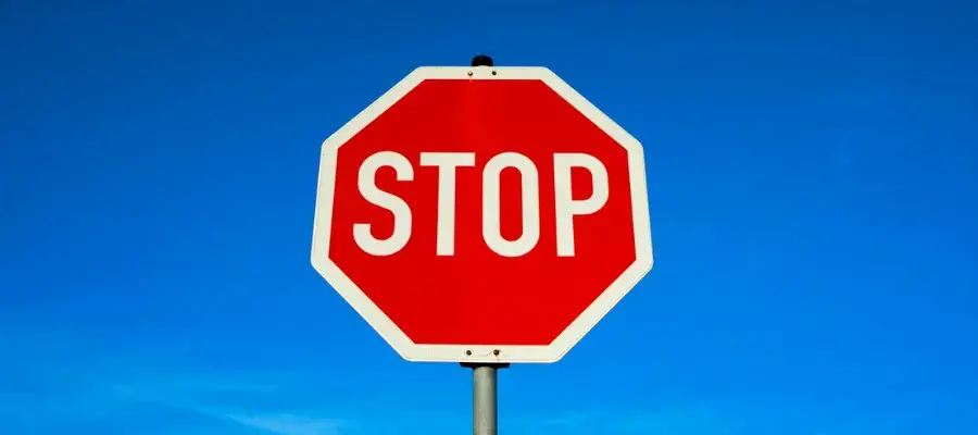 Stop sign on a blue background