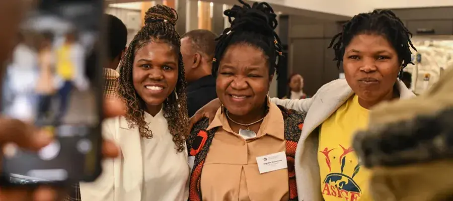 Forget Shareka (left) and Angie Murimirwa (centre) together at the Mastercard Foundation President’s Meeting held at the University of Edinburgh last year 