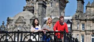 Three students outside in Edinburgh city centre