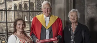 Alastair Salvesen, alongside members of his family, pose for a photo following a graduation ceremony at the University of Edinburgh where he received an honorary doctorate