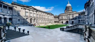 Image of Old College quad on a sunny day. Blue sky and dome in the background