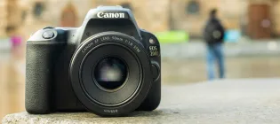 A camera on a granite step in front of McEwan Hall, Edinburgh