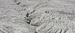 An exhibition of scientists from the European Space Agency examining the Gorner Glacier in Switzerland