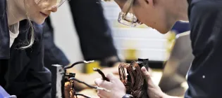 Students work on a prototype in a lab at King's Buildings