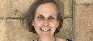 A head and shoulders photograph of Alexandra Walsham