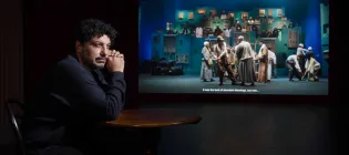 Artist Wael Shawky poses with his film installation Drama 1882 which makes its UK premiere at the Talbot Rice Gallery.
