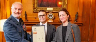 James Saville, Director of Human Resource (centre) and Sally Morgan, Technician Steering Committee Chair (right), accept the bronze award from the Ministry of Defence’s Employer Recognition Scheme. The award was presented by the Lowland Reserve Forces and Cadets Association. 