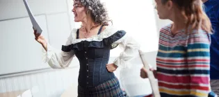 Members of the Edinbards amateur theatre group rehearse in a space provided by the access to rooms scheme